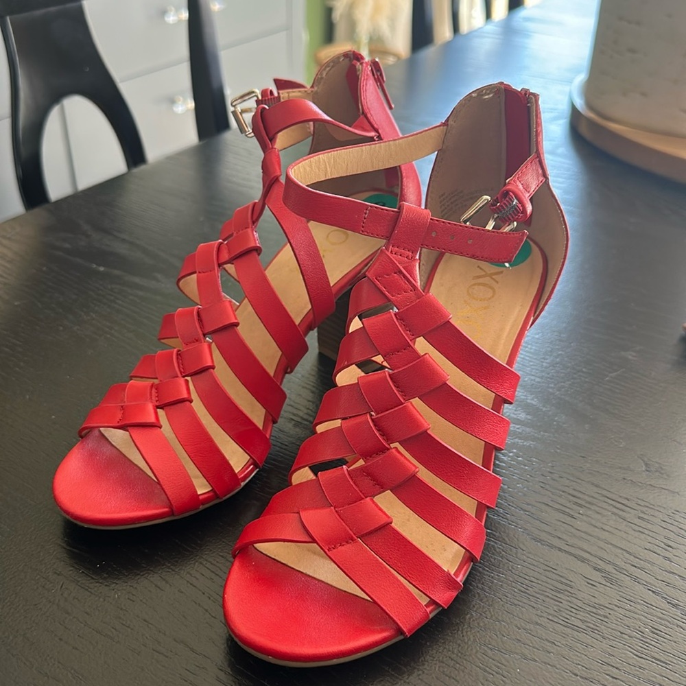 Red sandals with zipper back
